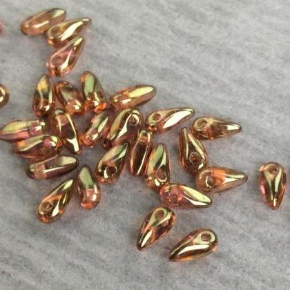 Czech Glass Mini Dagger Beads Luster Rose Gold..