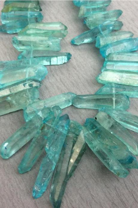 Graduated Aqua Blue Dyed Natural Quartz Points, 15 1/2 inch strand